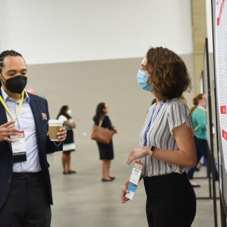CSTE Applied Epidemiology Fellow, Katelyn Mullins, presenting her poster during the poster session.