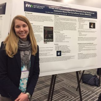 “Terra Wiens presenting her poster titled “Design and Implementation of the Minnesota Drug Overdose and Substance Abuse Pilot Surveillance System (MNDOSA) at the Midwest Injury Prevention Alliance (MIPA) Summit” Terra Wiens – CSTE AEF Class 15 Fellow at 2017 MIPA Summit